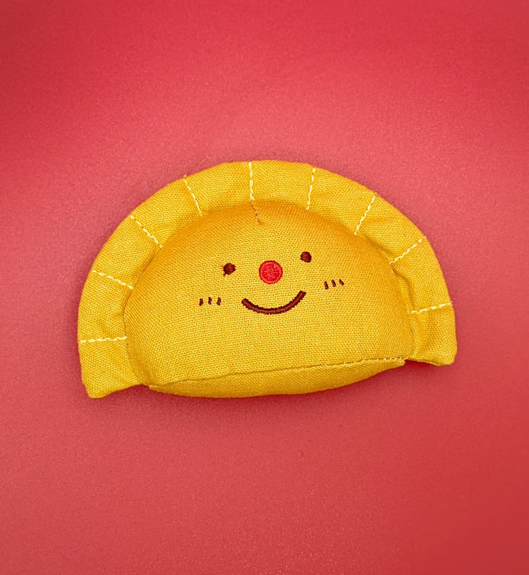 Empanada dog toy front view - Designed by Natali Koromoto